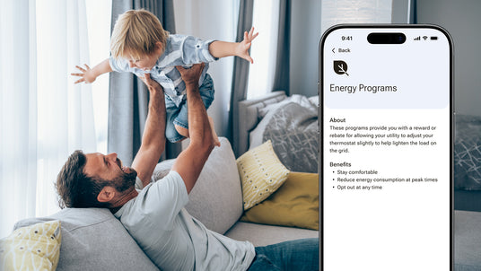 A smartphone displays benefits of energy programs with benefits and rewards on the Resideo Connect app. A father plays with his son on their couch.