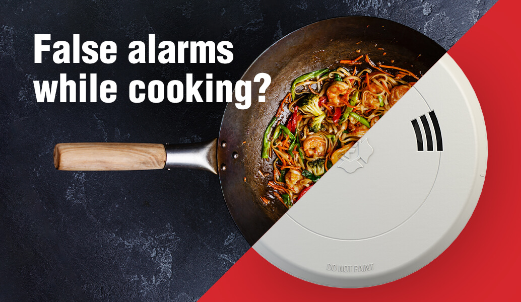 A skillet cooking food and a smoke alarm. Text: False alarms while cooking?